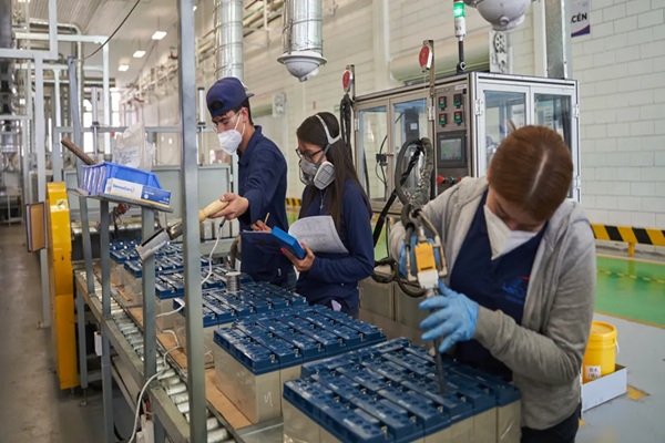 Workers weld